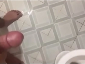 Asian boy indulges in solo play, inviting viewers to watch